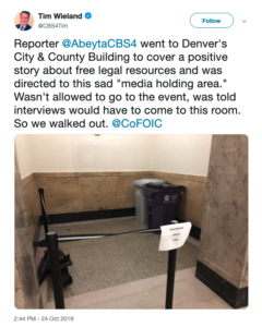 Small trash room area roped off for reports at the denver city and county building